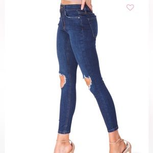 Free people busted knee skinny jeans.